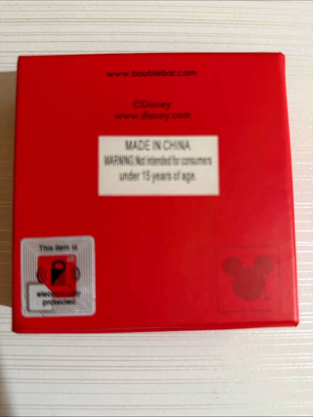 Disney x BaubleBar holiday bow earrings feature a dangling red Minnie Mouse head - Picture 4 of 4